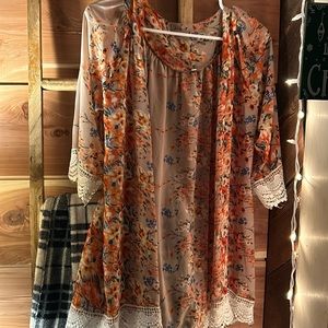 Size small western throw over with flower detail.